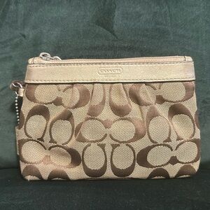 Coach wristlet- monogram classic brown and gold